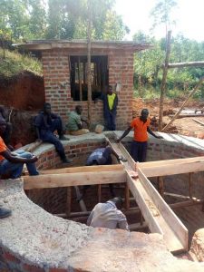 Work on well in Uganda