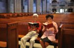 Couple praying in church